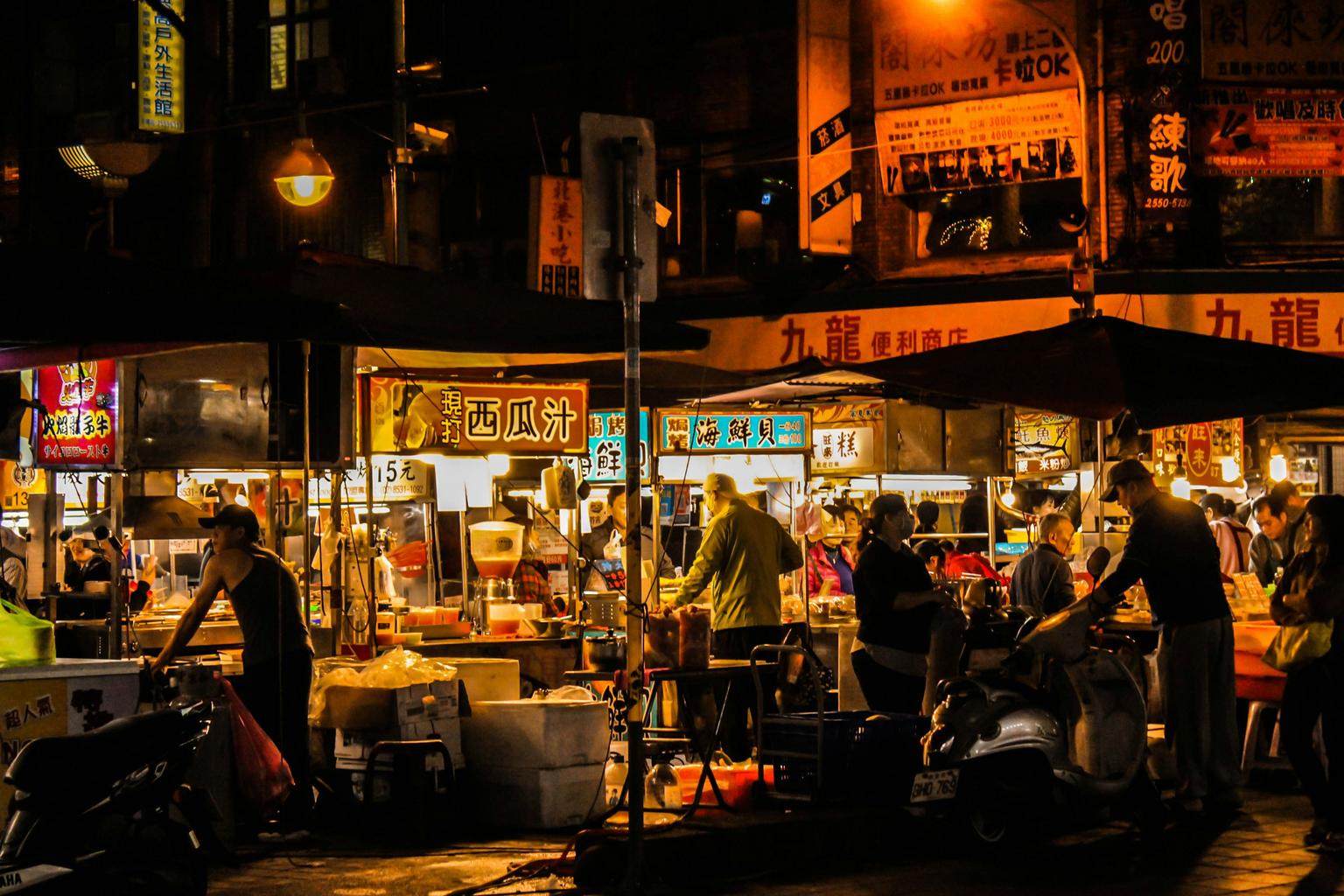 Varied street food offerings on a Friday night food tour