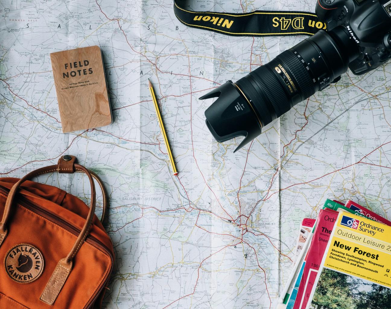 Automated travel itinerary generator interface showing grouped locations and schedule